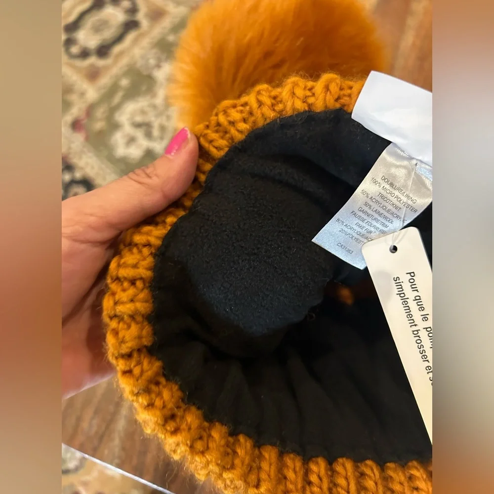 Free People-Pinnacle Pompom
Beanie NWT Mustard color with Pompon
(New) - Picture 7 of 7